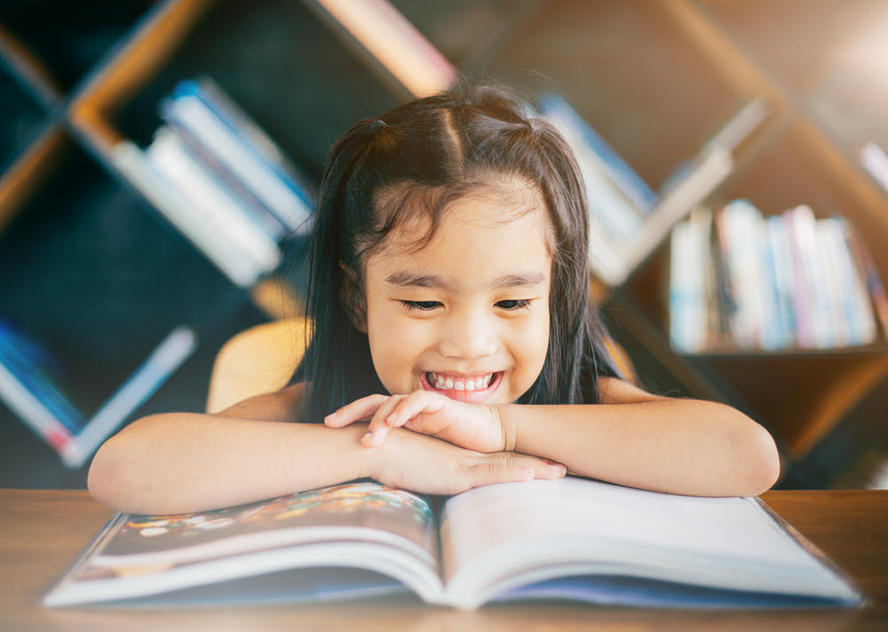 Design for Conscious Living - Celia Alida Rutte Shares Fun Tips on Back to School Decor - Inspired by Books - Photo of Girl Reading