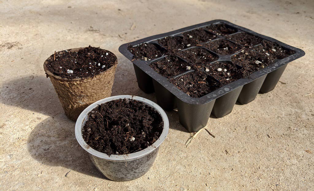 A photo of three different types of seeding pots.